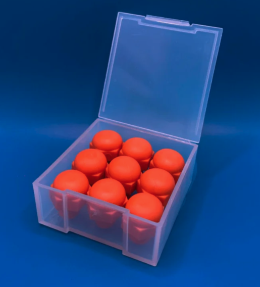 A pack of 9 bright orange Studfast studs is shown