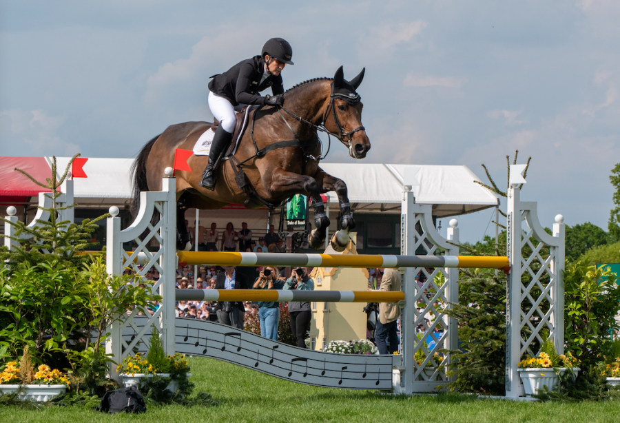 Caroline Powell wins Badminton: Caroline is pictured clearing an oxer in the final showjumping phase