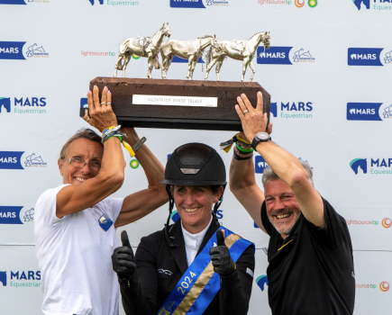 Caroline Powell is pictured with the trophy at Badminton Horse Trials