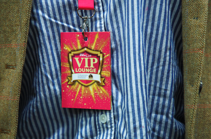 A close up of a VIP Your Horse Live ticket lanyard is shown